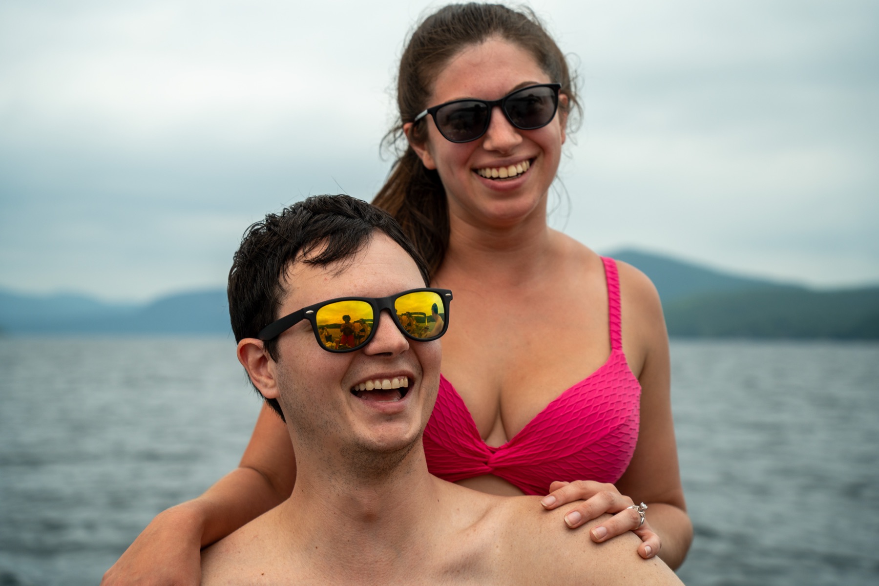 Couple on a boat during their engagement session