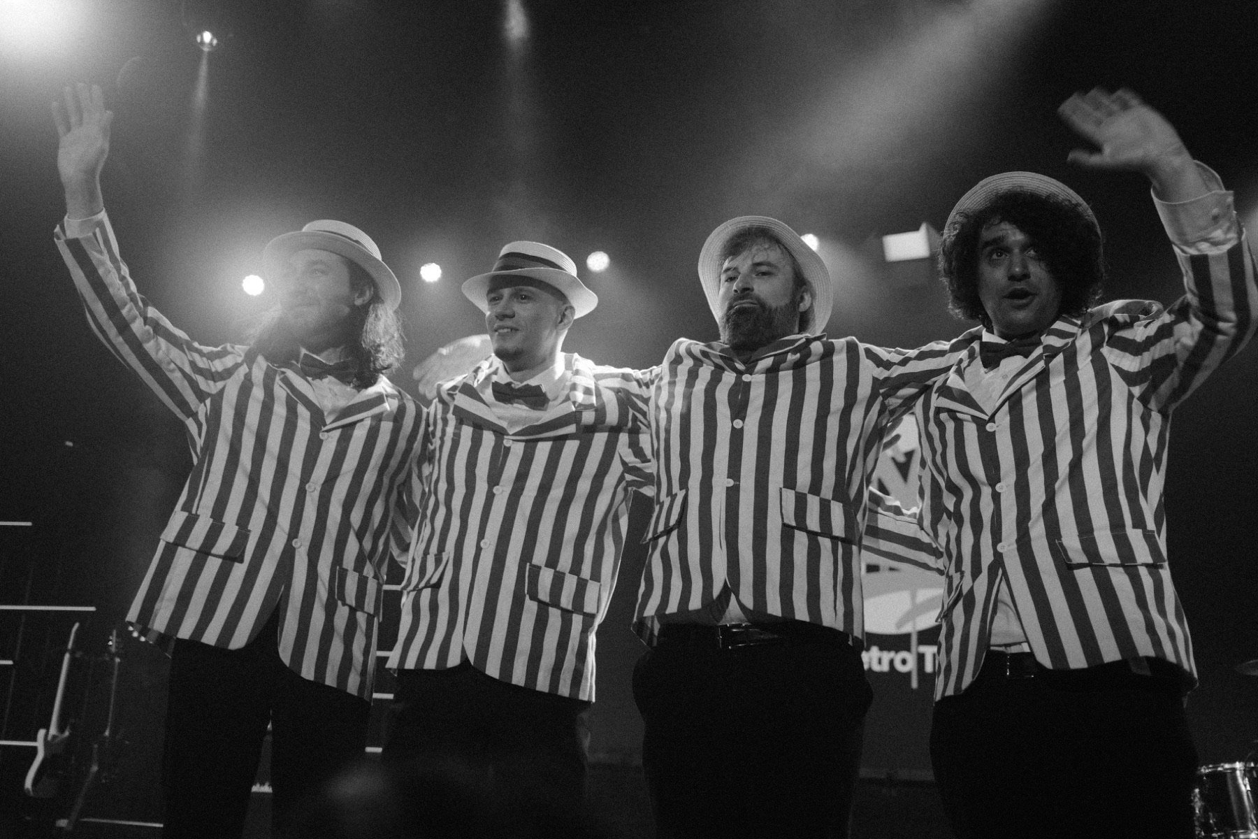 Barbershop quartet performing live